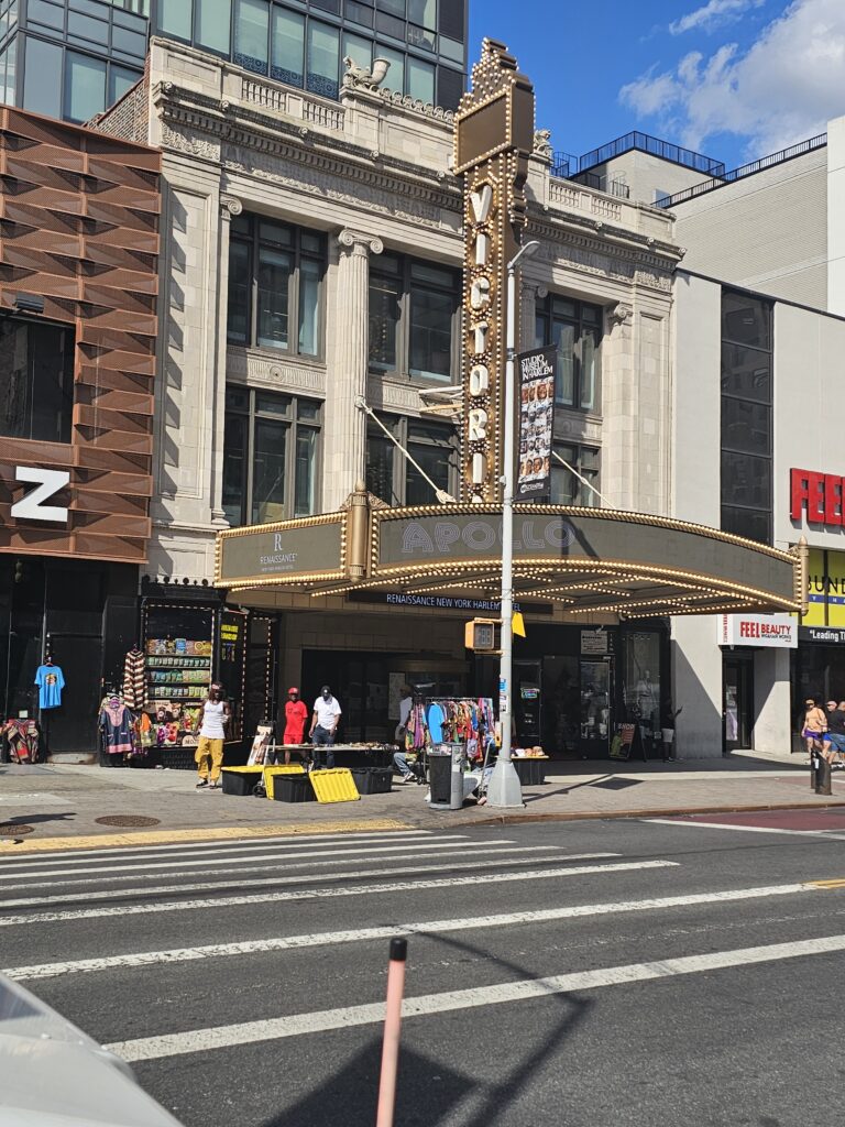 Apollo Theater Harlem neon marquee sign at night NYC