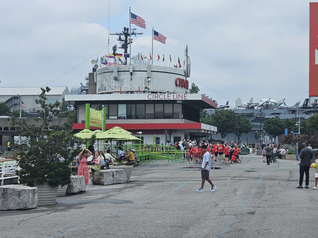 Circle Line Pier 83 Manhattan entrance with tour boats docked on the Hudson River