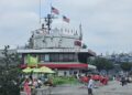 Circle Line Pier 83 Manhattan entrance with tour boats docked on the Hudson River