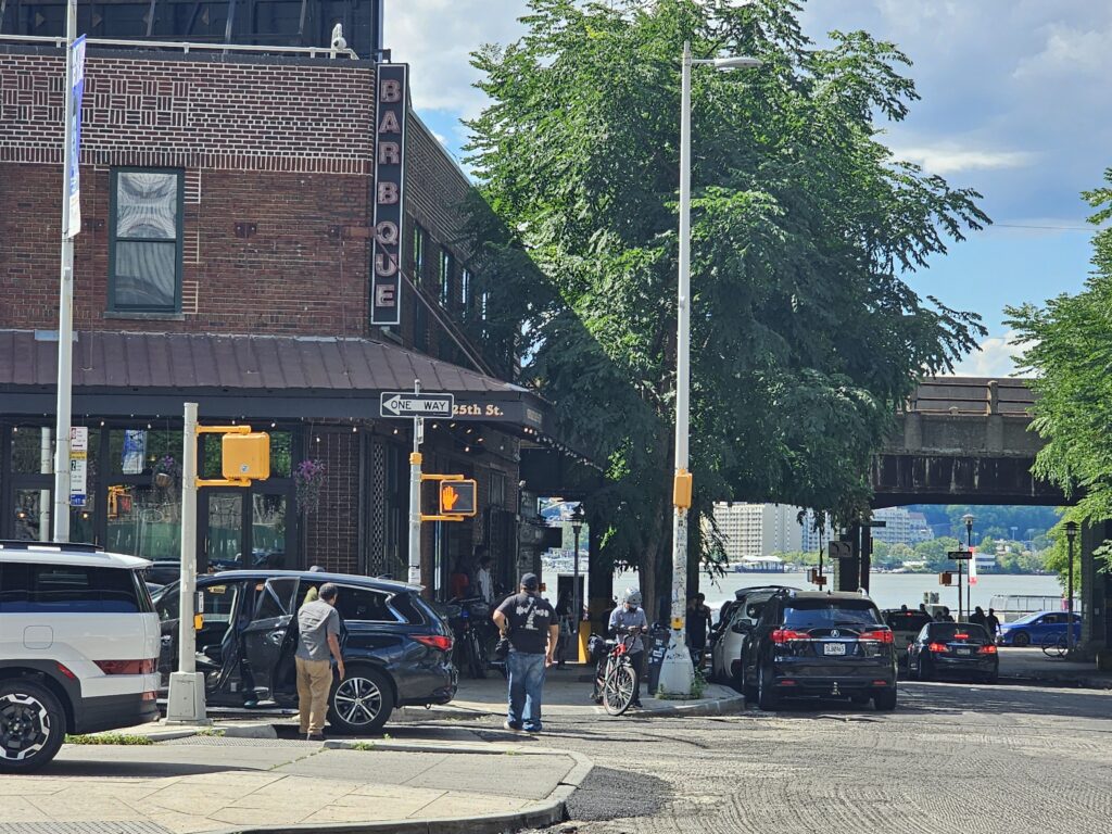 Dinosaur Bar-B-Que Harlem corner view with Hudson River in background NYC