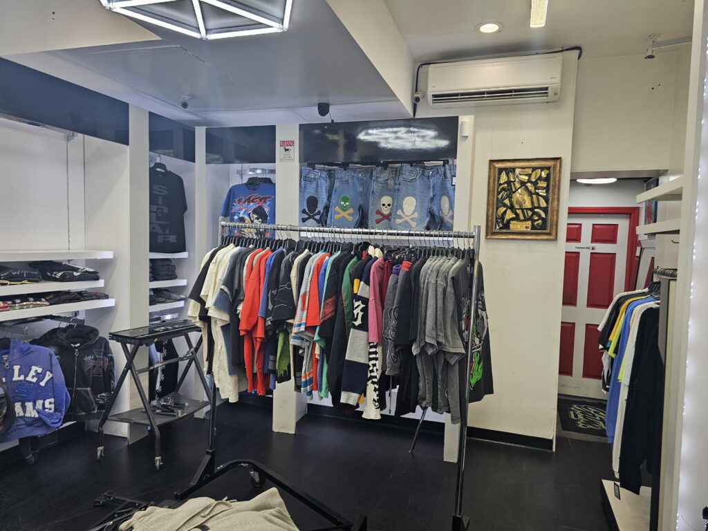 Empire Uptown NYC interior clothing racks streetwear hoodies jackets Dyckman Street