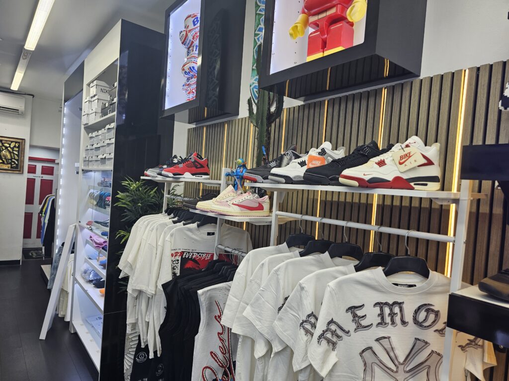 Empire Uptown NYC sneaker wall Air Jordan Nike Dunk streetwear boutique Inwood Manhattan