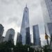 National September 11 Memorial and One World Trade Center skyline view NYC
