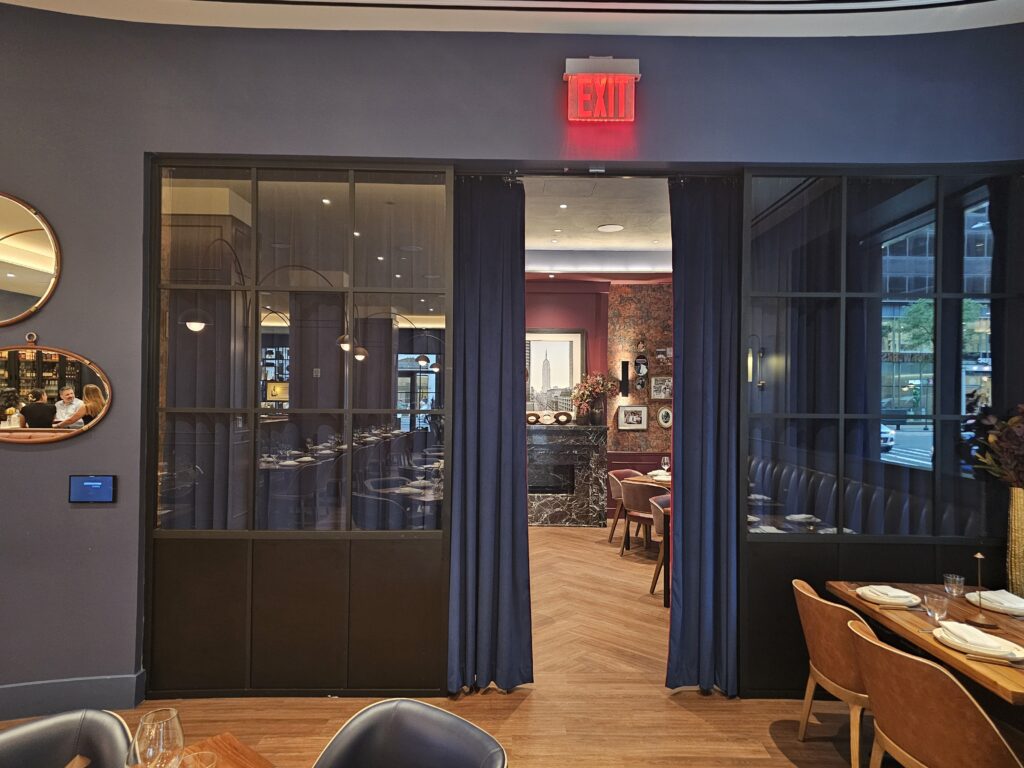 : Entrance to Tallow Steakhouse inside Shaver Hall Fifth Avenue
