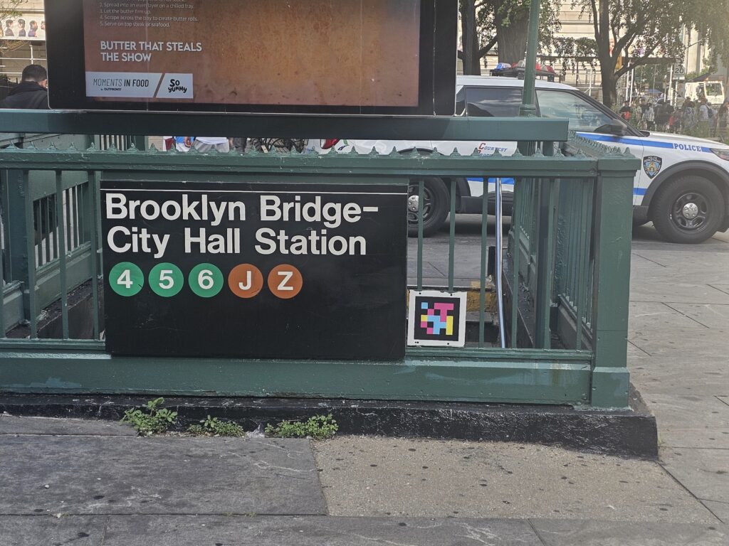 Brooklyn Bridge–City Hall subway station entrance sign for the 4, 5, 6, J, and Z trains