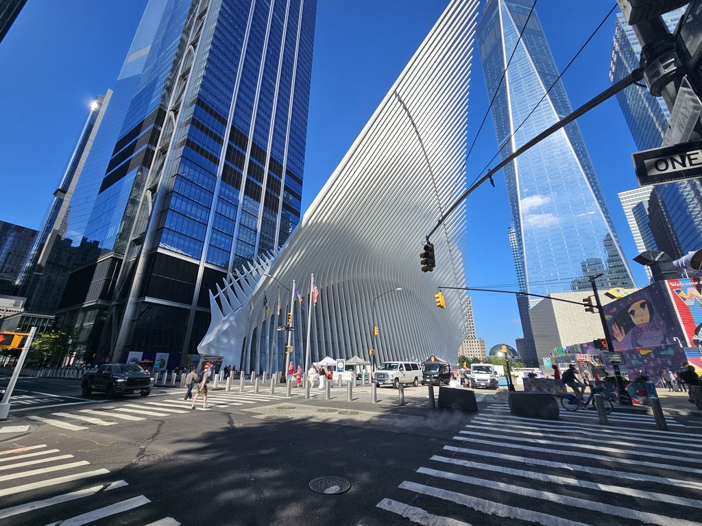 Oculus World Trade Center exterior with One World Trade Center skyline
