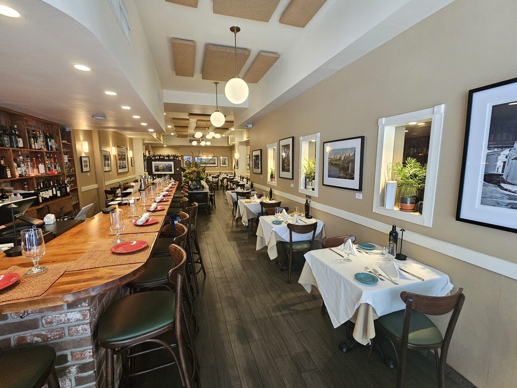 Dining room interior at La Terra Midtown East with warm lighting