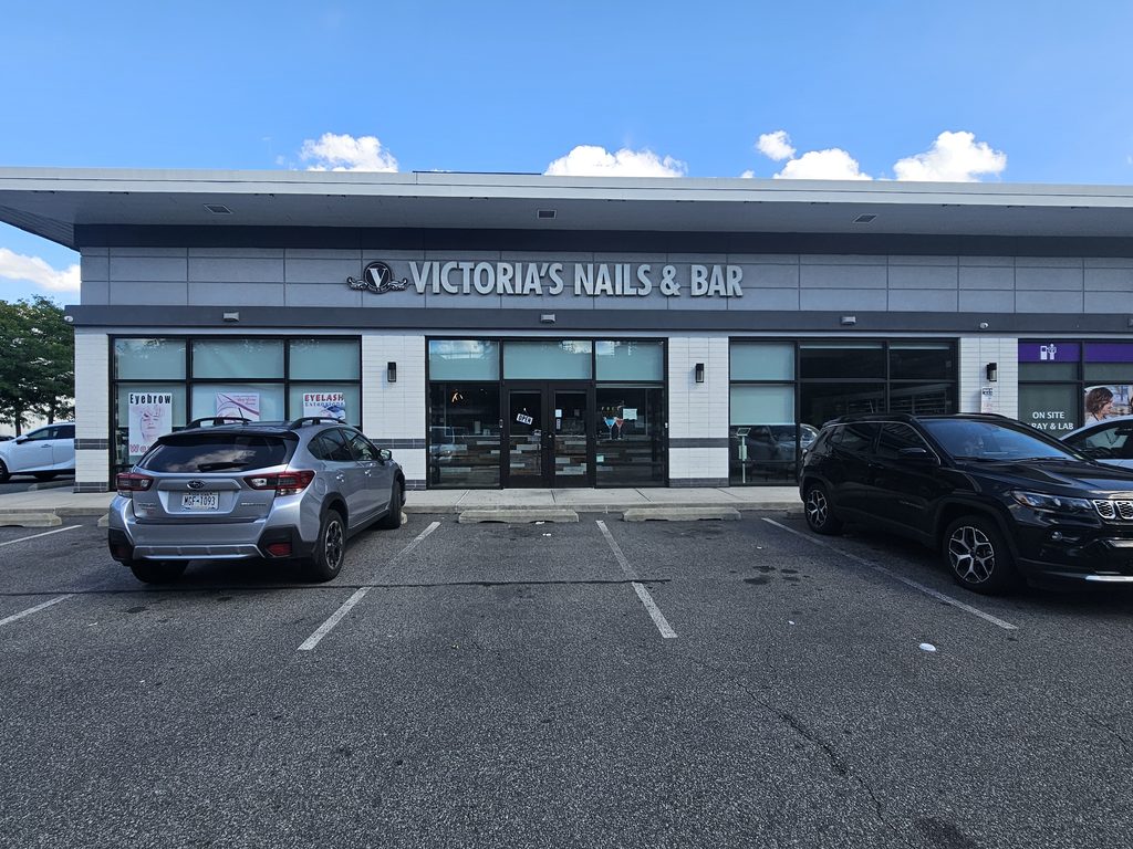 Victoria's Nails Bronx storefront with on-site parking lot