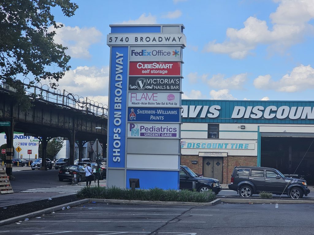 5740 Broadway plaza directory sign listing Victoria's Nails Bronx