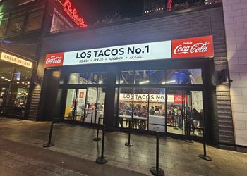 Manhattan West plaza at night steps from Los Tacos No.1 NYC