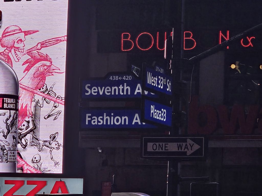 West 33rd Street and Seventh Avenue street sign near Los Tacos No.1 NYC