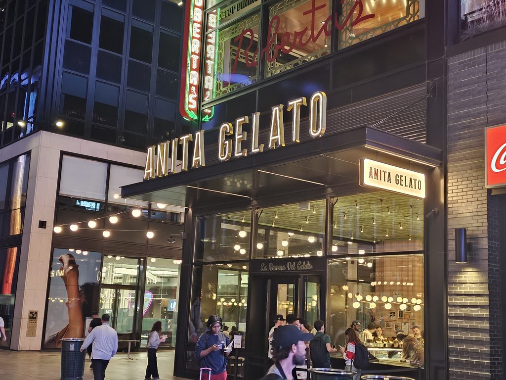 Anita Gelato NYC storefront sign at night near Penn Station
