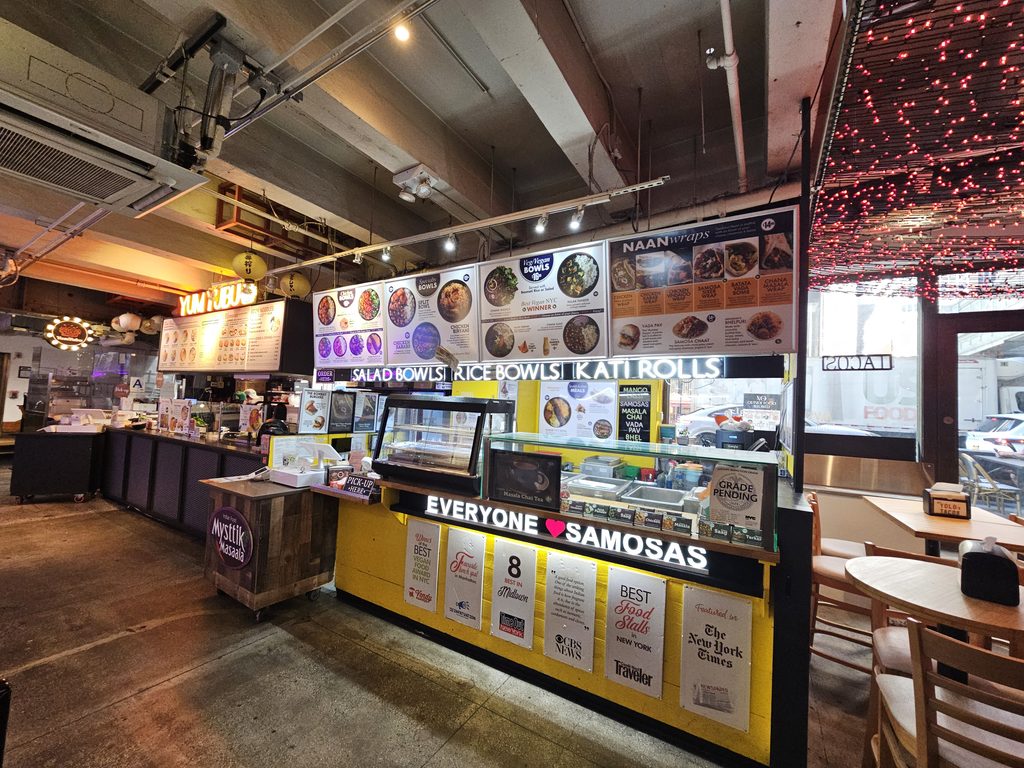 Indian food counter and dining area at Vanderbilt Market NYC