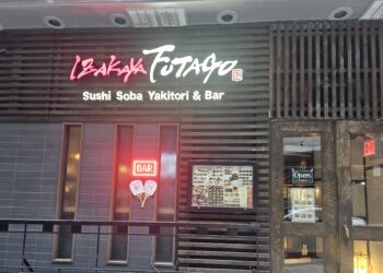 Izakaya Futago NYC storefront sign with neon Bar light at night