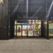Le Botaniste Bryant Park storefront sign above the glass entrance at night