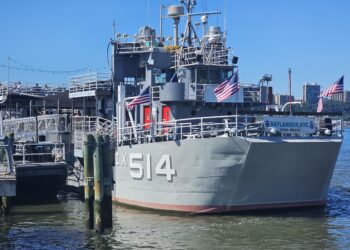 Baylander Steel Beach ship bow marked IX-514, docked at West Harlem Piers
