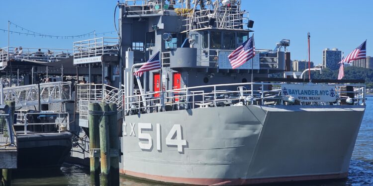 Baylander Steel Beach ship bow marked IX-514, docked at West Harlem Piers