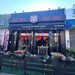 El Jefe Sports Cantina storefront on Dyckman Street with sugar skull logo and outdoor patio