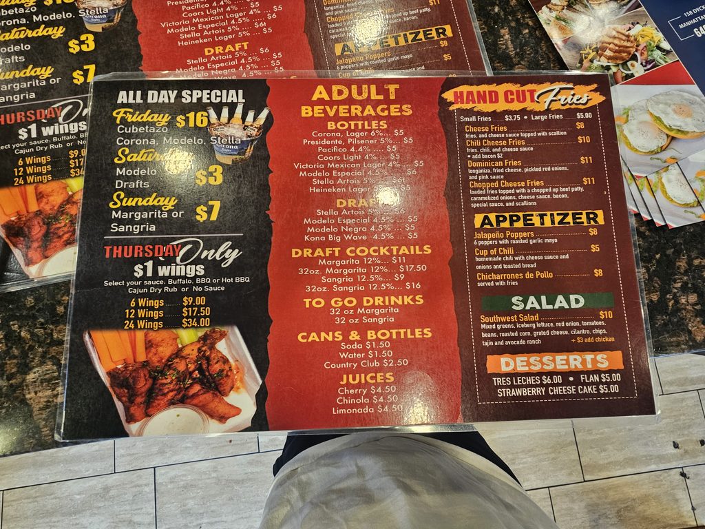 Dyckman Dogs NYC happy hour drink and appetizer menu board