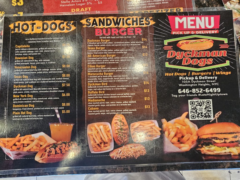 Dyckman Dogs NYC menu board listing hot dogs, burgers, and wings