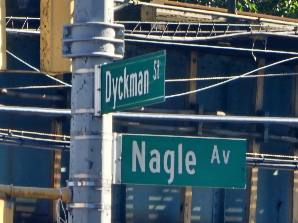 Dyckman Street and Nagle Avenue street sign near Dyckman Dogs NYC
By Car or Rideshare