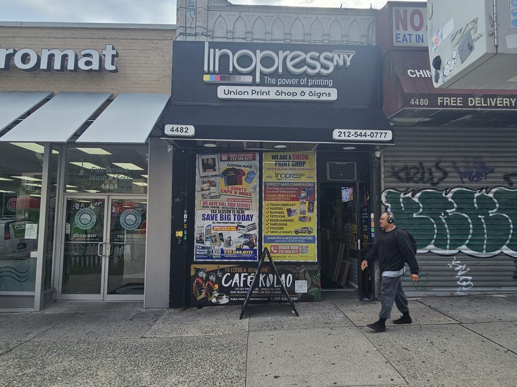 Lino Press NY storefront sign and awning on Broadway in Washington Heights, NYC