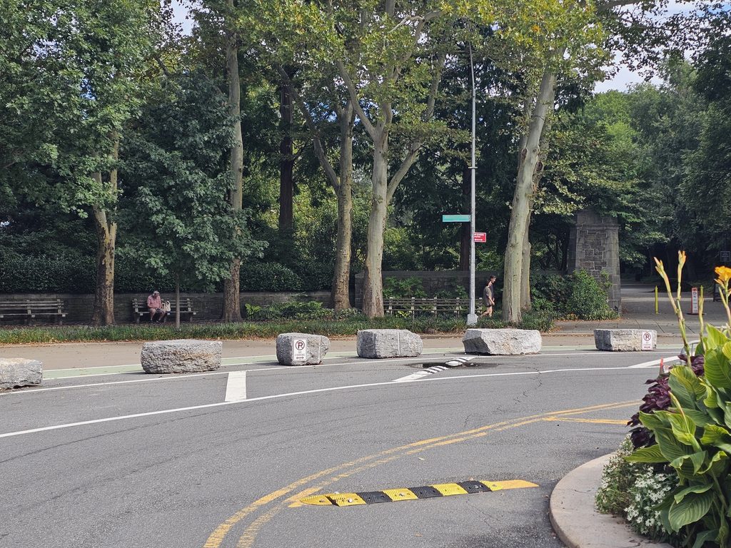 Roadside entrance and landscaped edge of Fort Tryon Park NYC