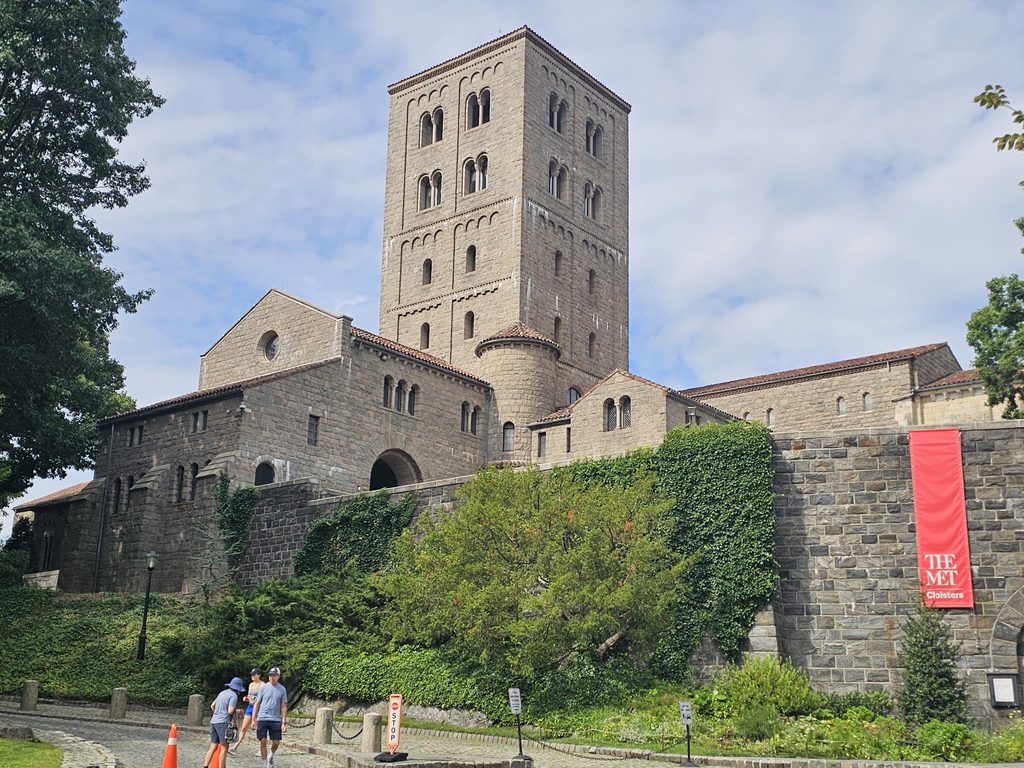 The Met Cloisters medieval-style stone building and tower in Fort Tryon Park NYC