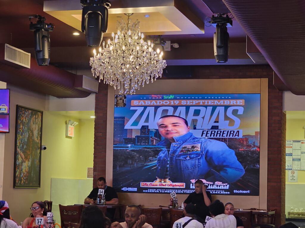 La Casa del Mofongo concert screen advertising a Zacarias Ferreira show