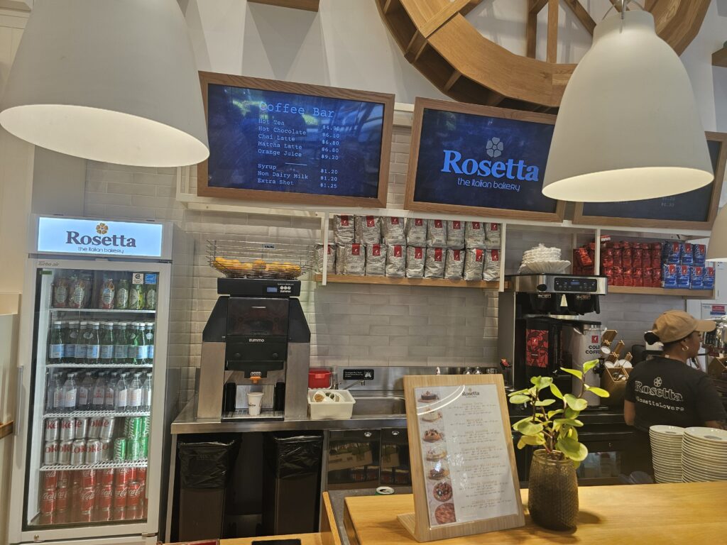 Rosetta Bakery Coffee Bar menu board and drink refrigerator