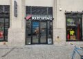 Red Wing Shoes NYC flagship storefront entrance with red wing logo at 11 Penn Plaza in Midtown Manhattan