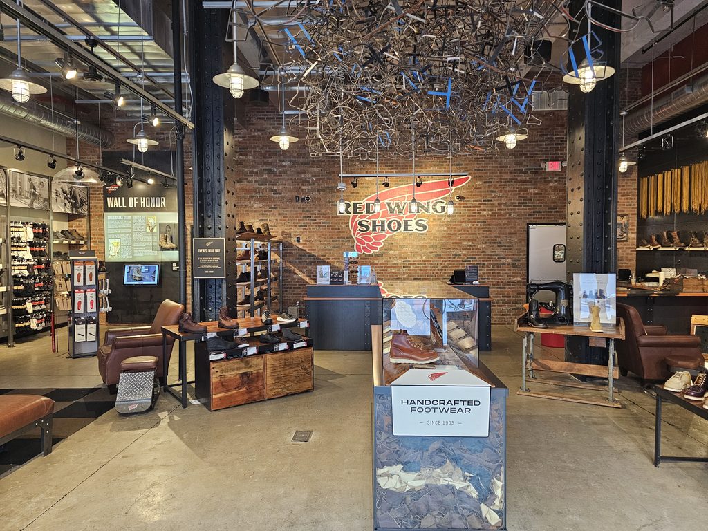 Handcrafted footwear display and repair area inside Red Wing Shoes NYC flagship