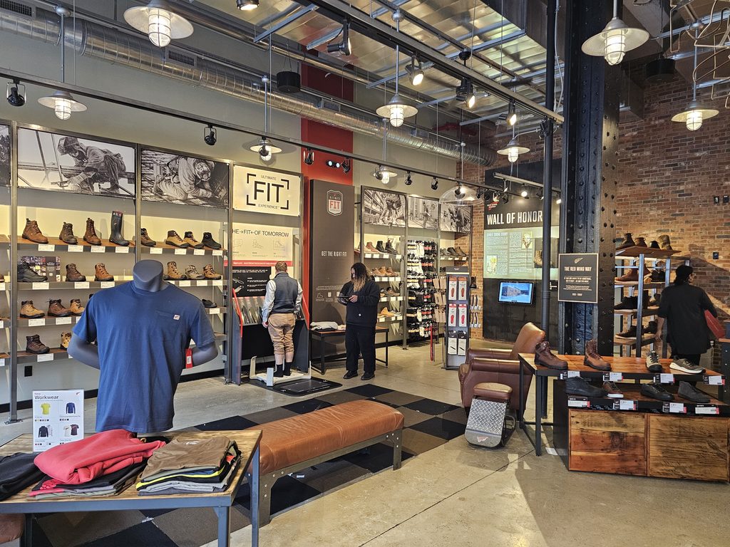 Ultimate Fit Experience station with staff helping a customer at Red Wing Shoes NYC