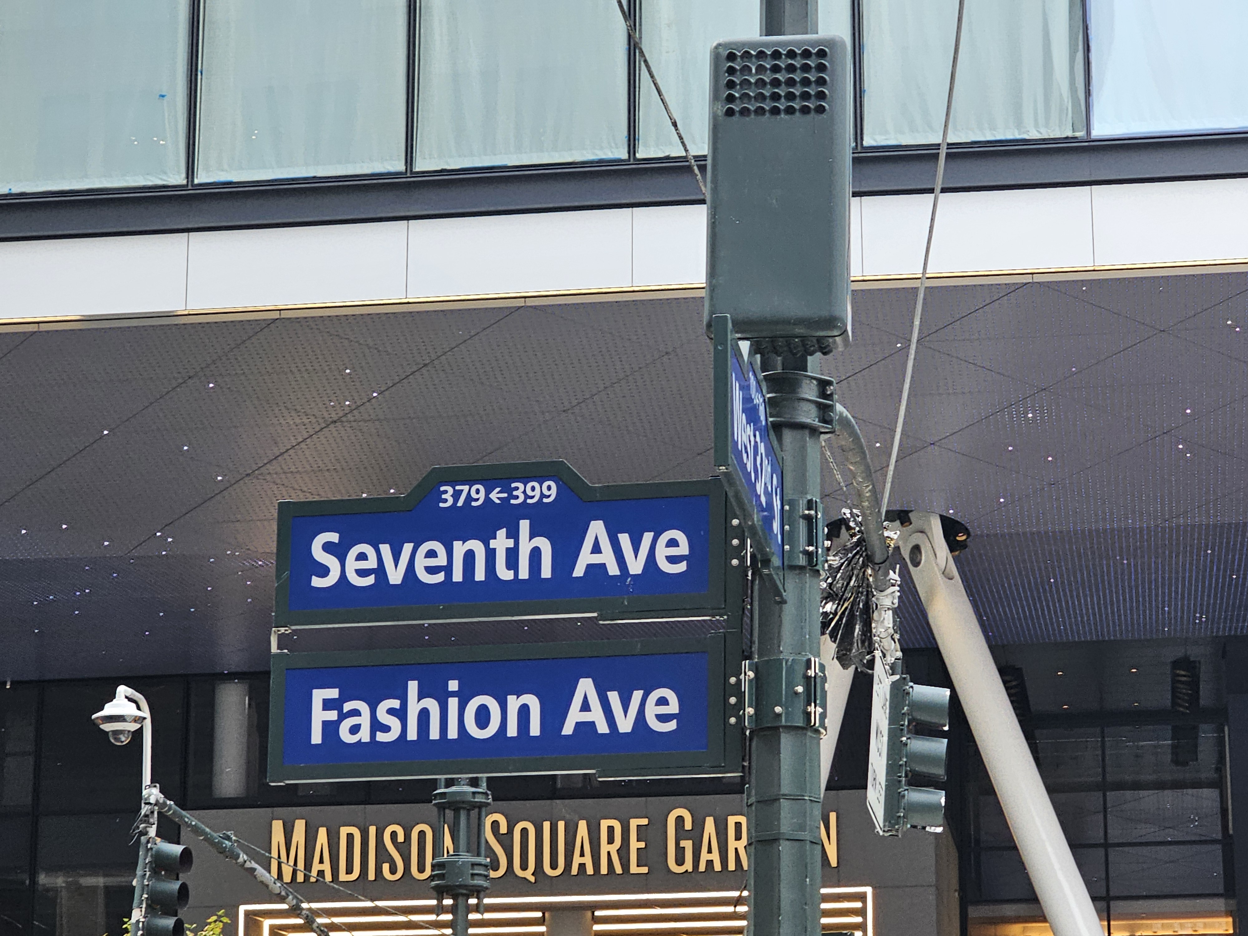 Seventh Avenue street sign and Penn Station entrance near Red Wing Shoes NYC