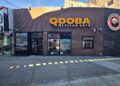 QDOBA Fordham Road storefront with the QDOBA Mexican Eats sign on W Fordham Road in the Bronx