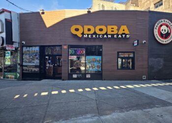 QDOBA Fordham Road storefront with the QDOBA Mexican Eats sign on W Fordham Road in the Bronx
