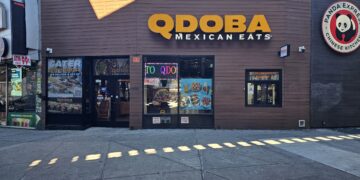 QDOBA Fordham Road storefront with the QDOBA Mexican Eats sign on W Fordham Road in the Bronx