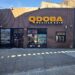 QDOBA Fordham Road storefront with the QDOBA Mexican Eats sign on W Fordham Road in the Bronx