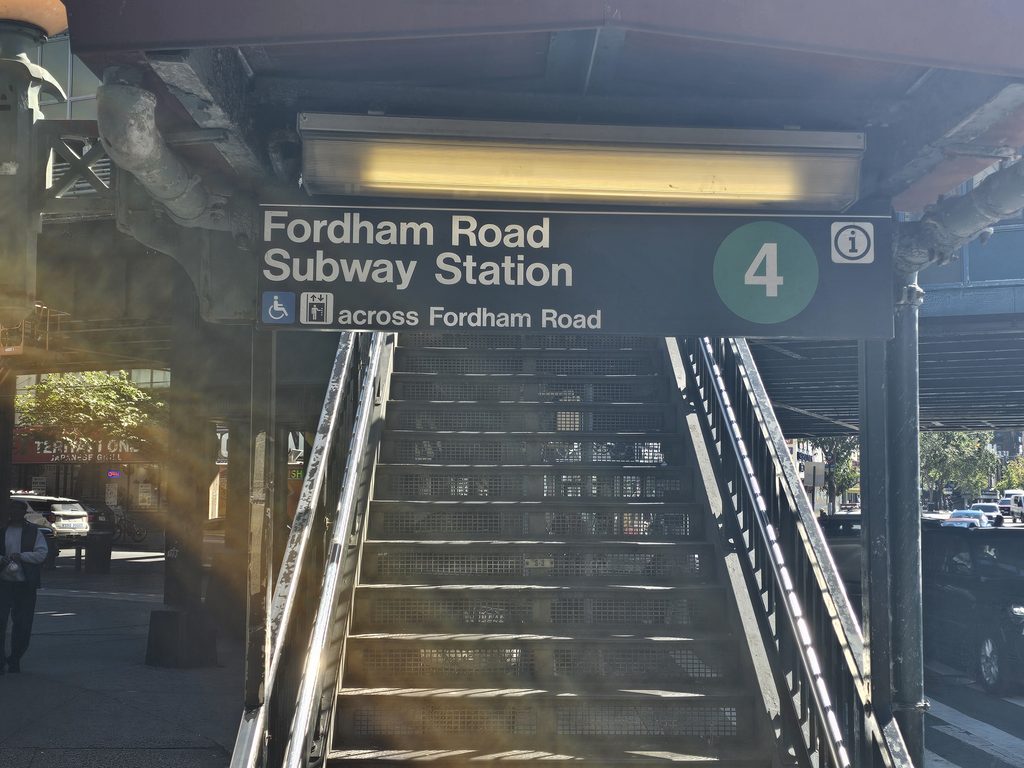 Fordham Road subway station entrance for the 4 train near QDOBA Fordham Road