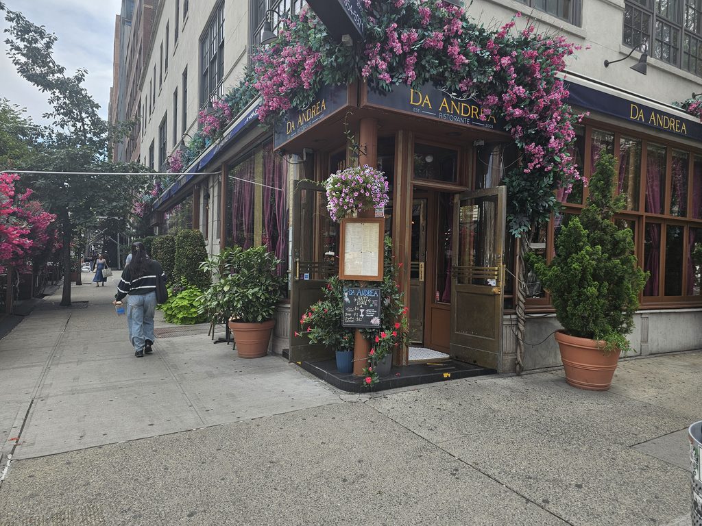 Da Andrea NYC exterior with its signature floral entrance.