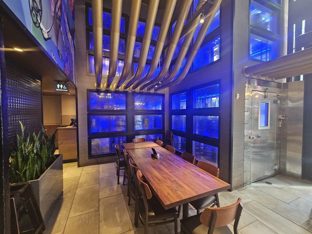 Yard House NYC private-style dining area with booth seating
