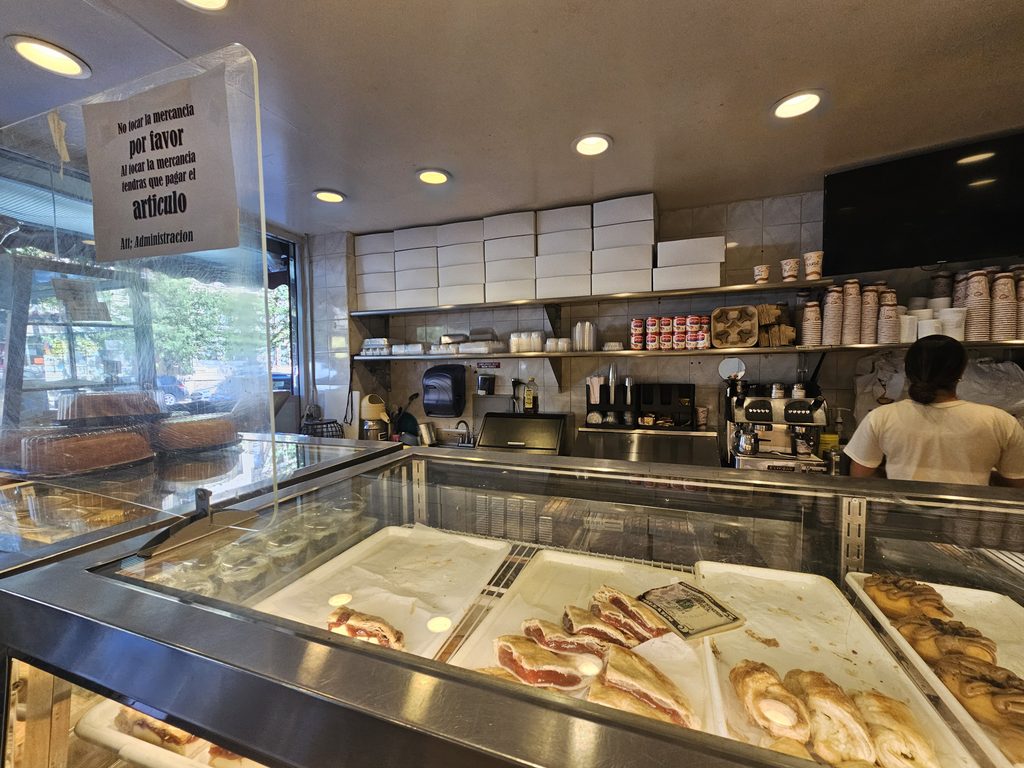 Interior view of the bakery counter at Bizcocho de Colores Party Supply