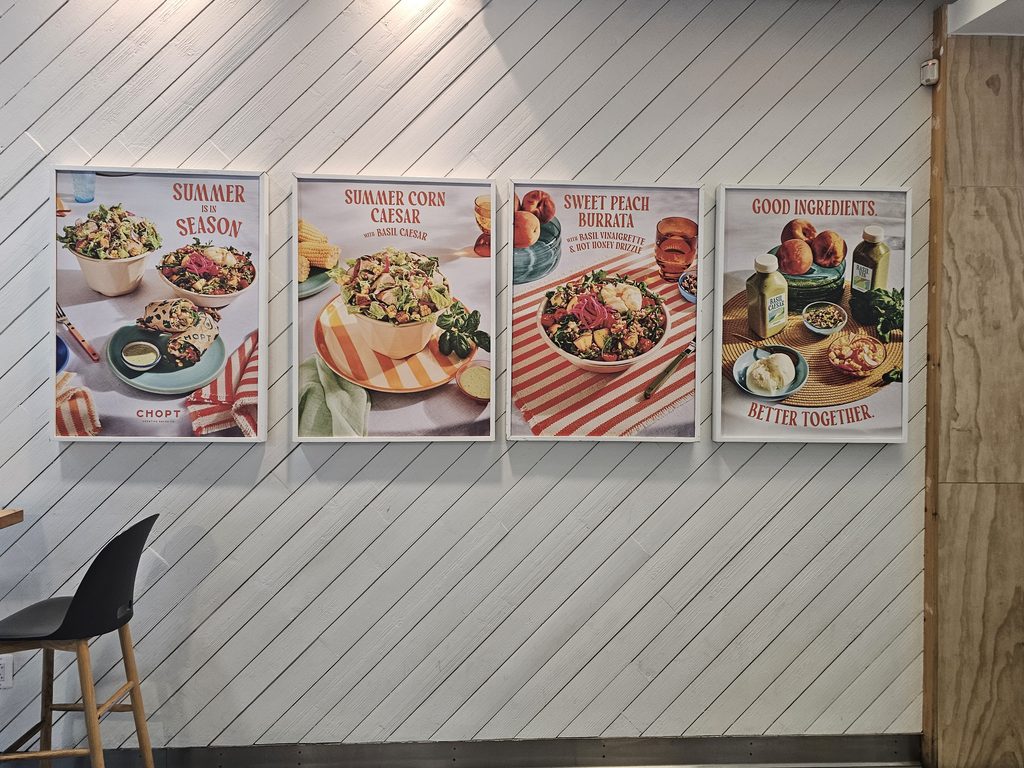 Seasonal Summer Corn Caesar and Sweet Peach Burrata posters at Chopt Midtown Manhattan