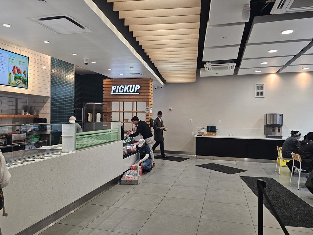 Pickup station and seating area inside Chopt Midtown Manhattan